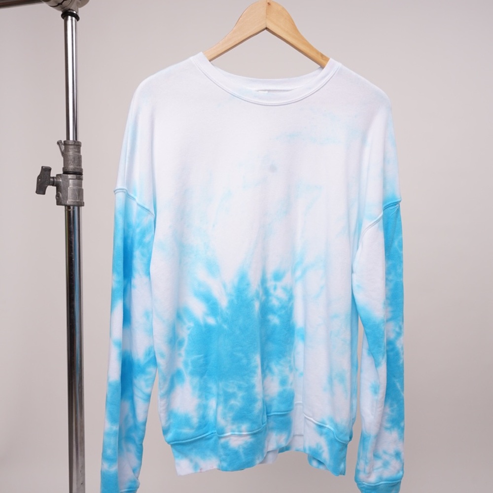 ‘Head in the clouds’ tie dye sweater